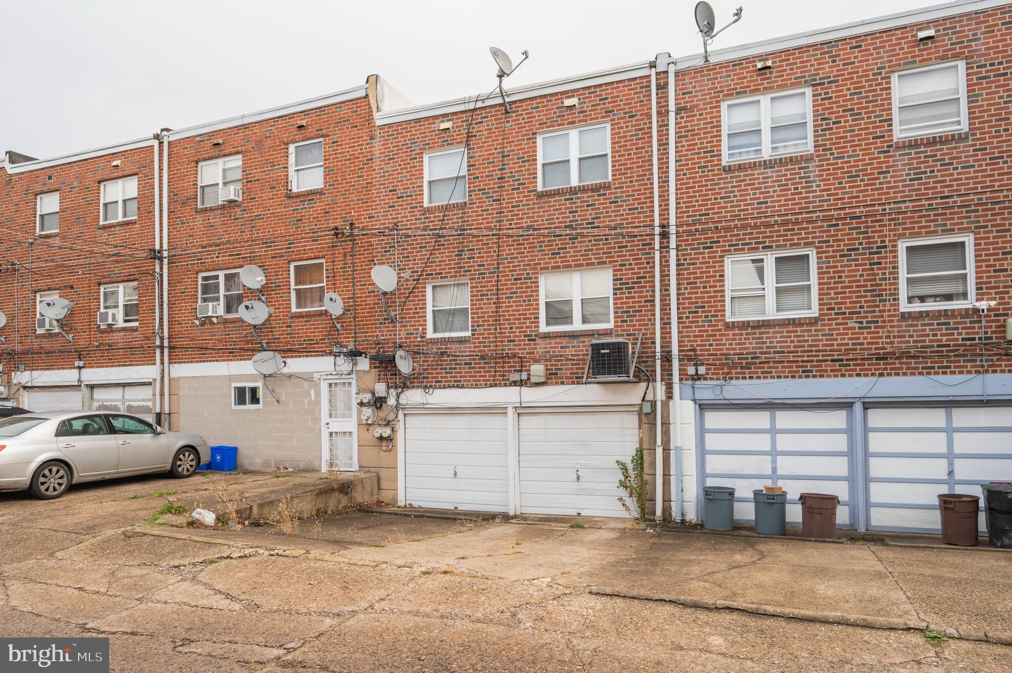 2588 Cranston Road Philadelphia, PA 19131 - Photo 35 of 38 a front view of a building with a yard