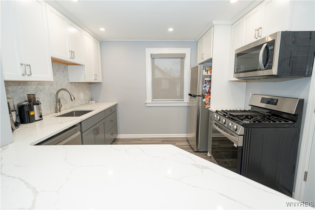 397 Sanders Road Buffalo, NY 14216 - Photo 20 of 44 Upper Kitchen with Luxury vinyl plank floor