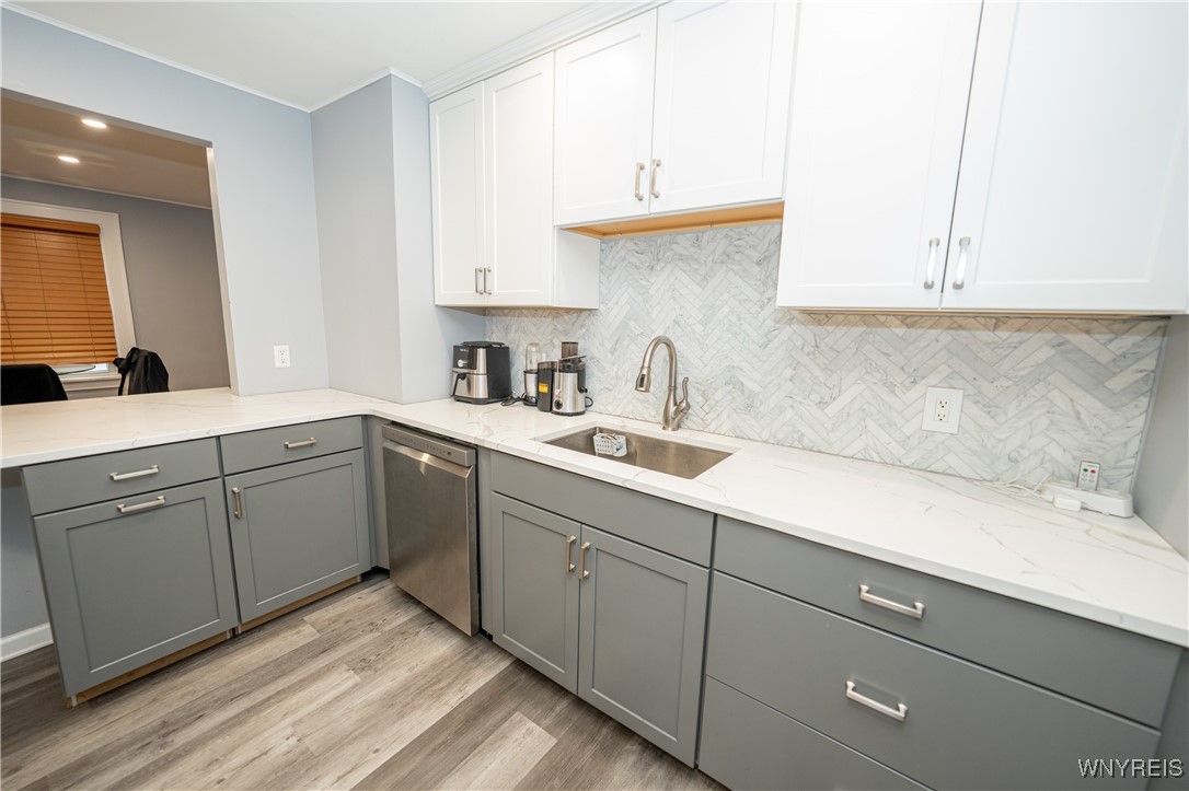 397 Sanders Road Buffalo, NY 14216 - Photo 22 of 44 Upper has Breakfest bar that opens to Dining room