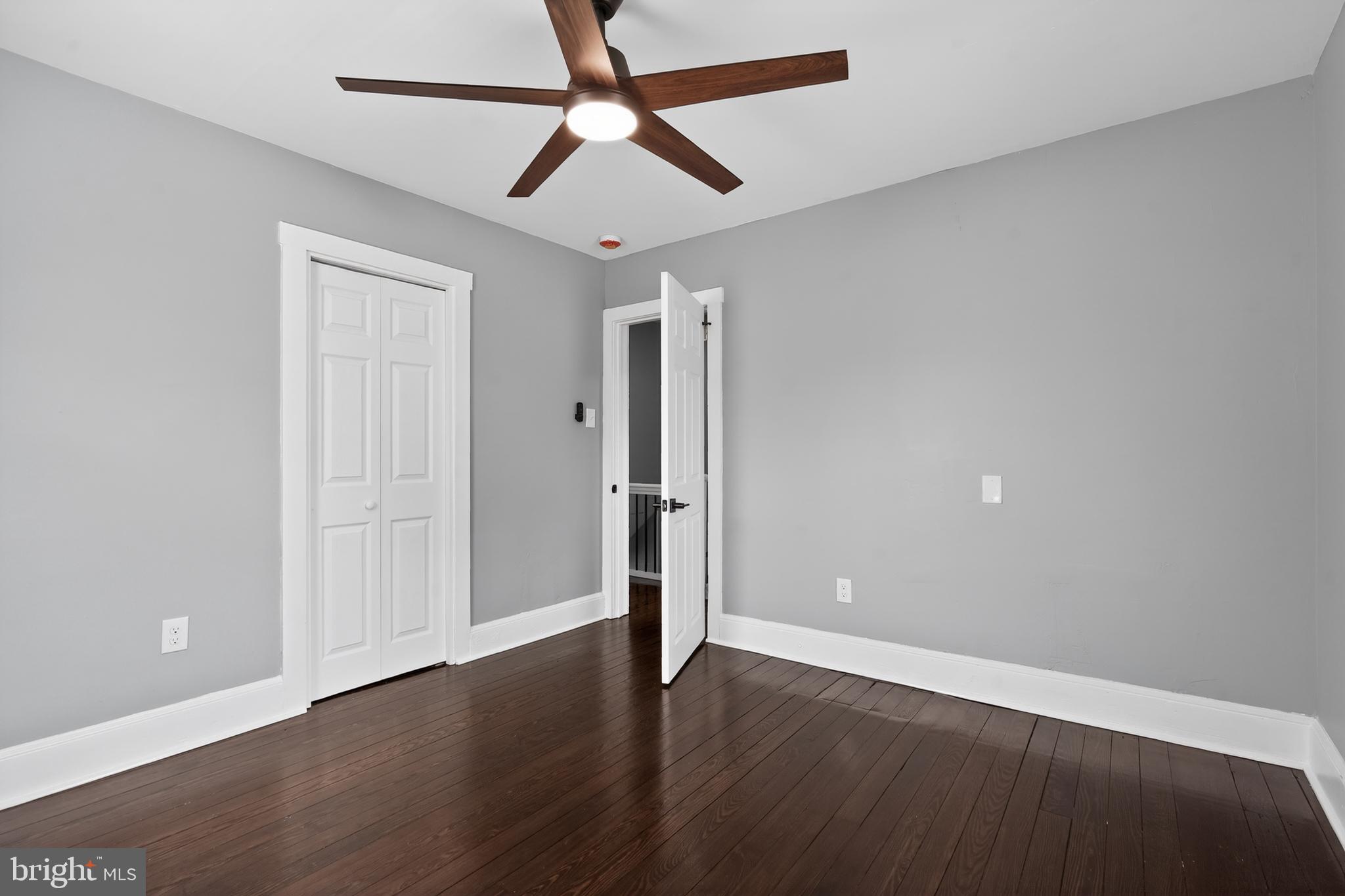 223 Noreg Place Brooklawn, NJ 08030 - Photo 28 of 36 a view of room with wooden floor and ceiling fan