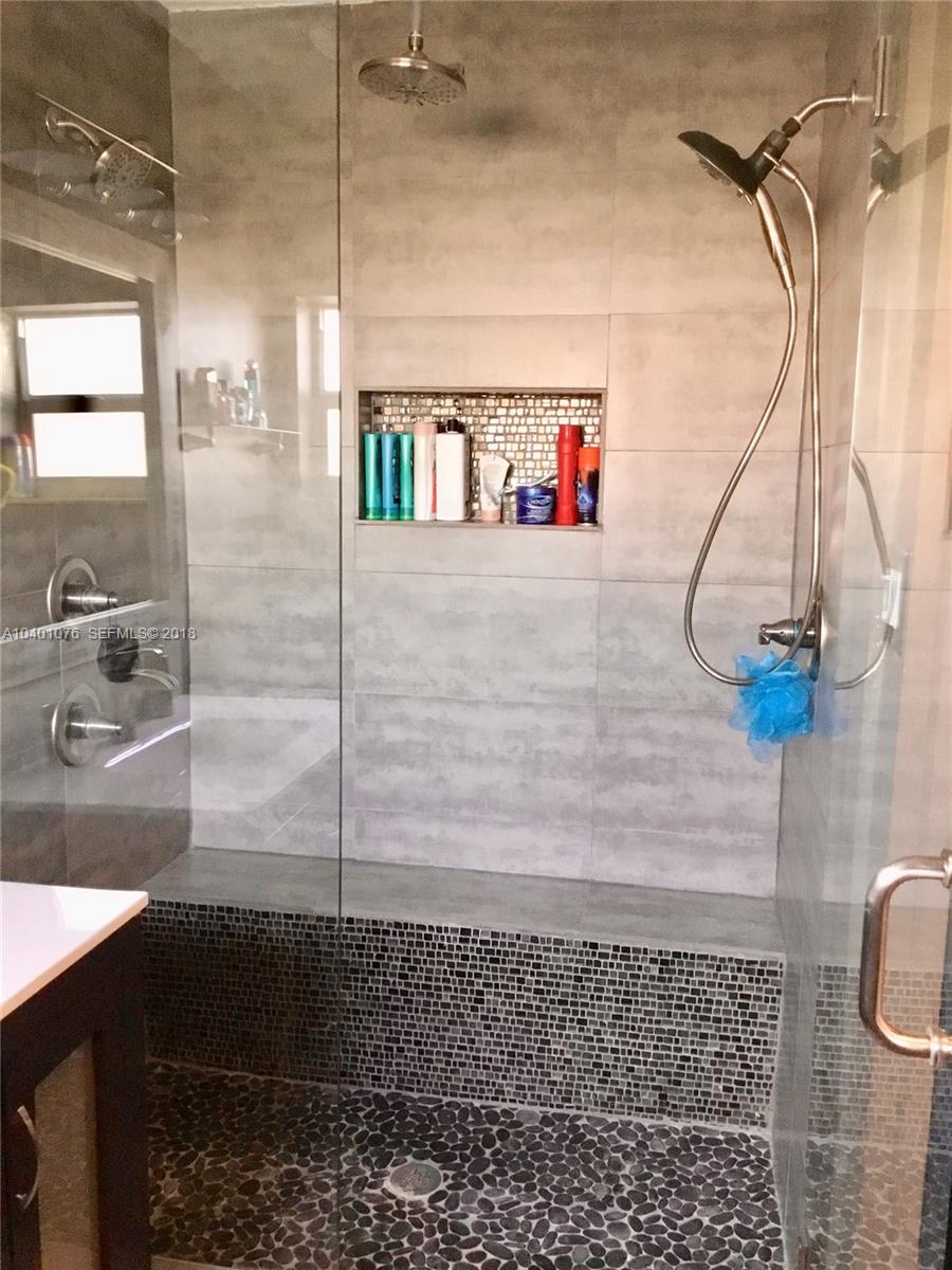 20010 Island Road Cutler Bay, FL 33189 - Photo 16 of 24 a bathroom with a shower