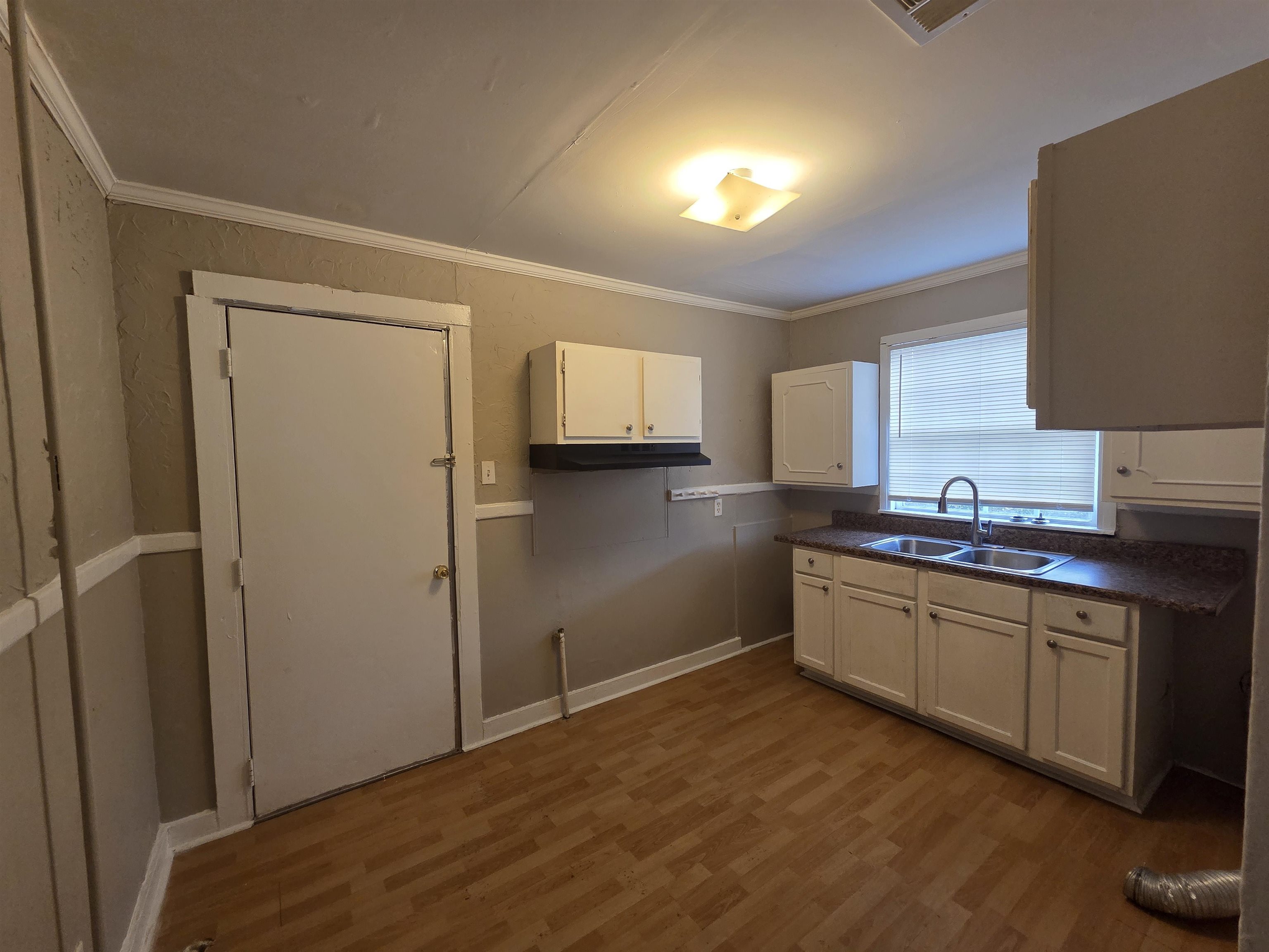 3458 Radford Road Memphis, TN 38111 - Photo 3 of 18 a kitchen with stainless steel appliances granite countertop a refrigerator and a sink