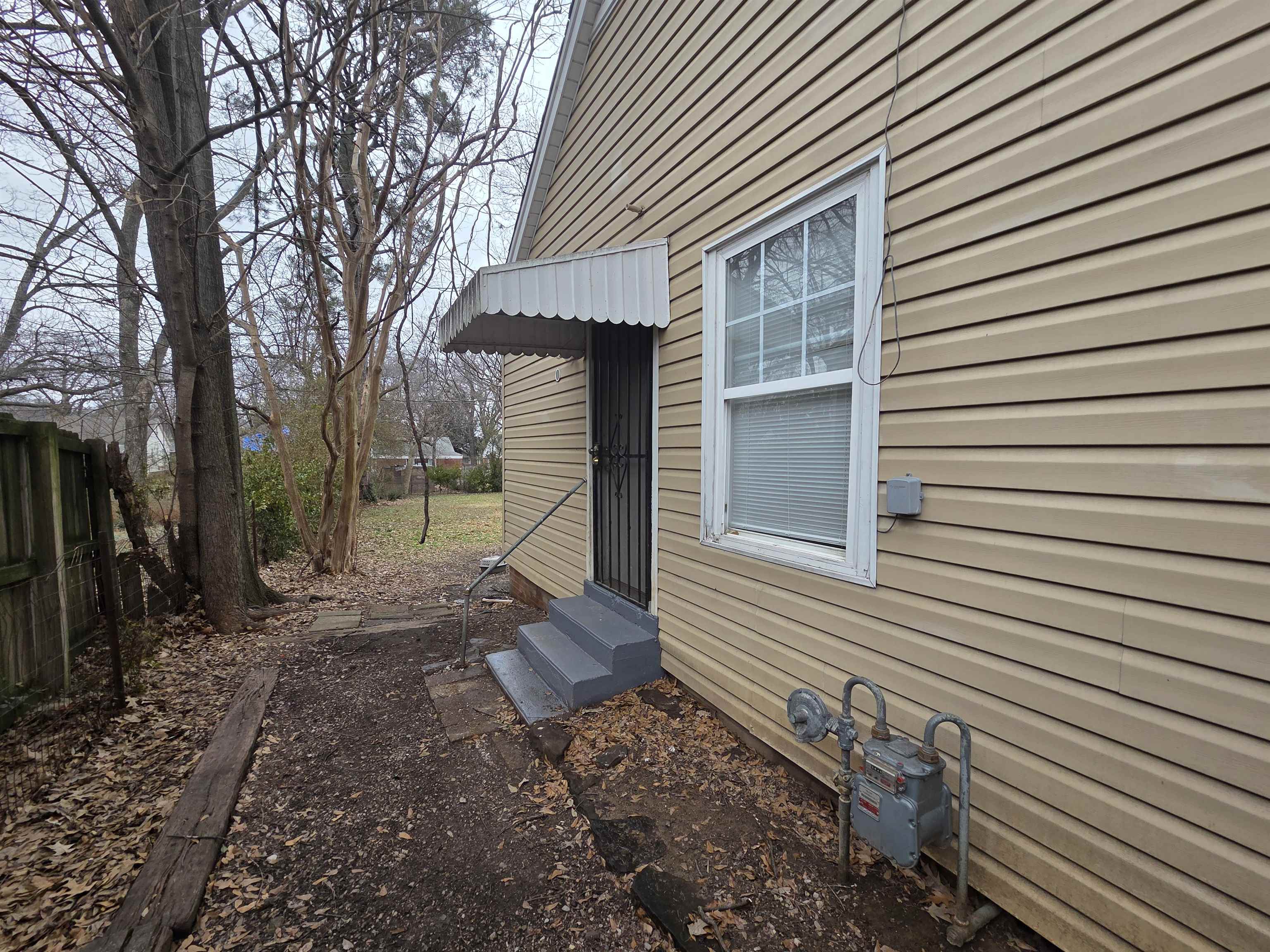 3458 Radford Road Memphis, TN 38111 - Photo 10 of 18 a view of a house with a yard and tree s