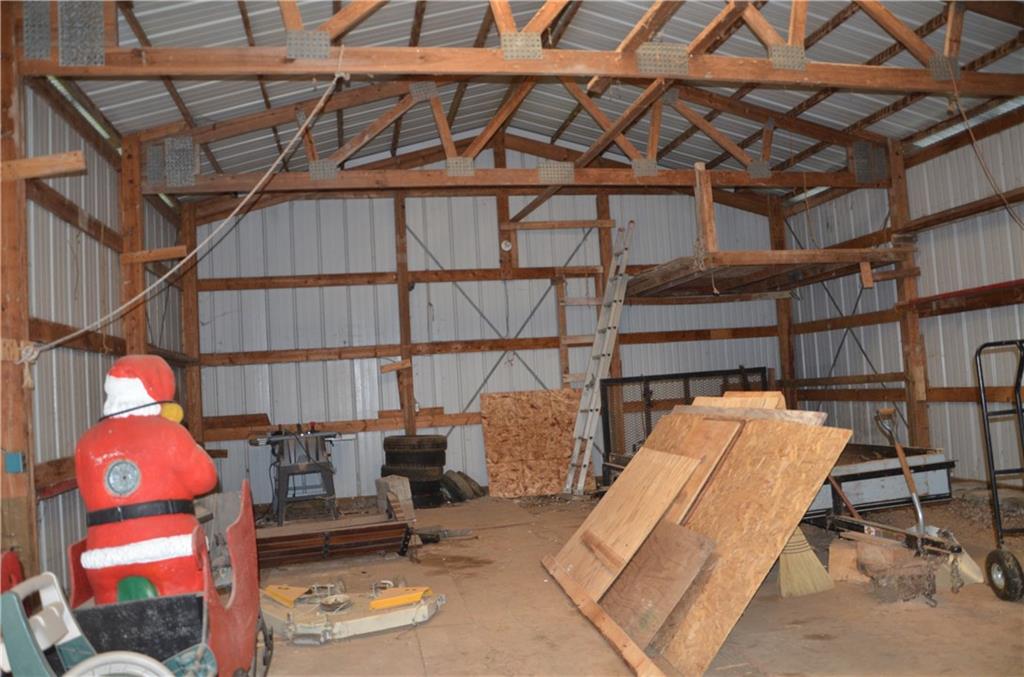 INSIDE OF BARN. NICE SKYLIGHTS KEEP IT BRIGHT.
