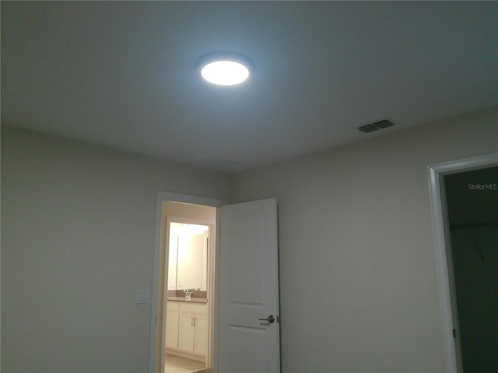 1146 Trappers Trail Loop Davenport, FL 33896 - Photo 25 of 31 a view of an empty room