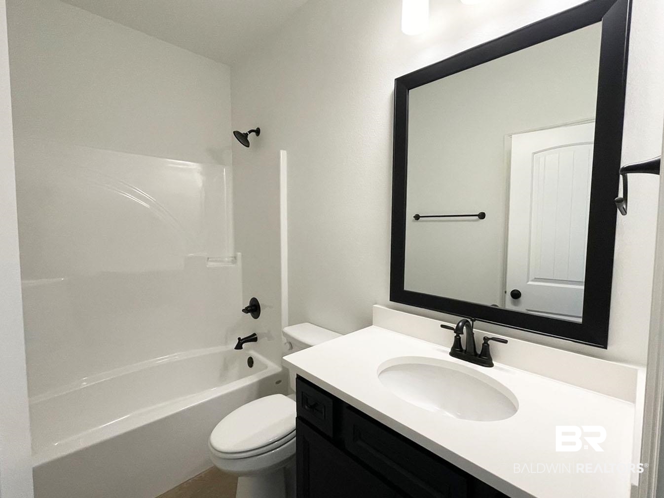 1396 Fenton Circle Foley, AL 36535 - Photo 10 of 14 Full bathroom with toilet, vanity, and bathing tub / shower combination