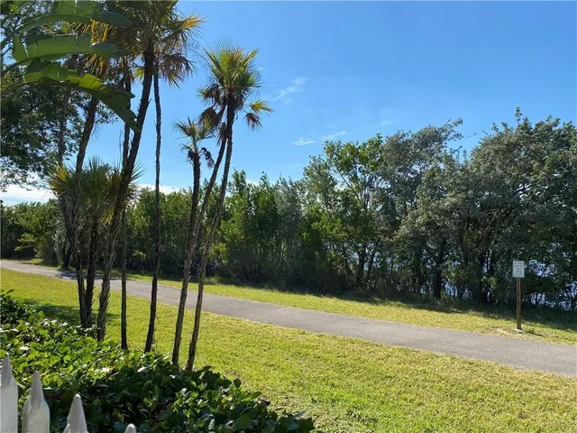 a view of a swimming pool with an outdoor space