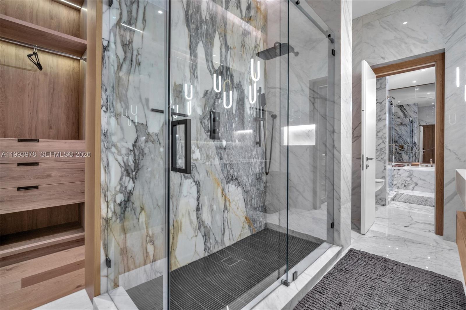 46 Northeast 162nd Street Miami, FL 33162 - Photo 28 of 44 a bathroom with a shower