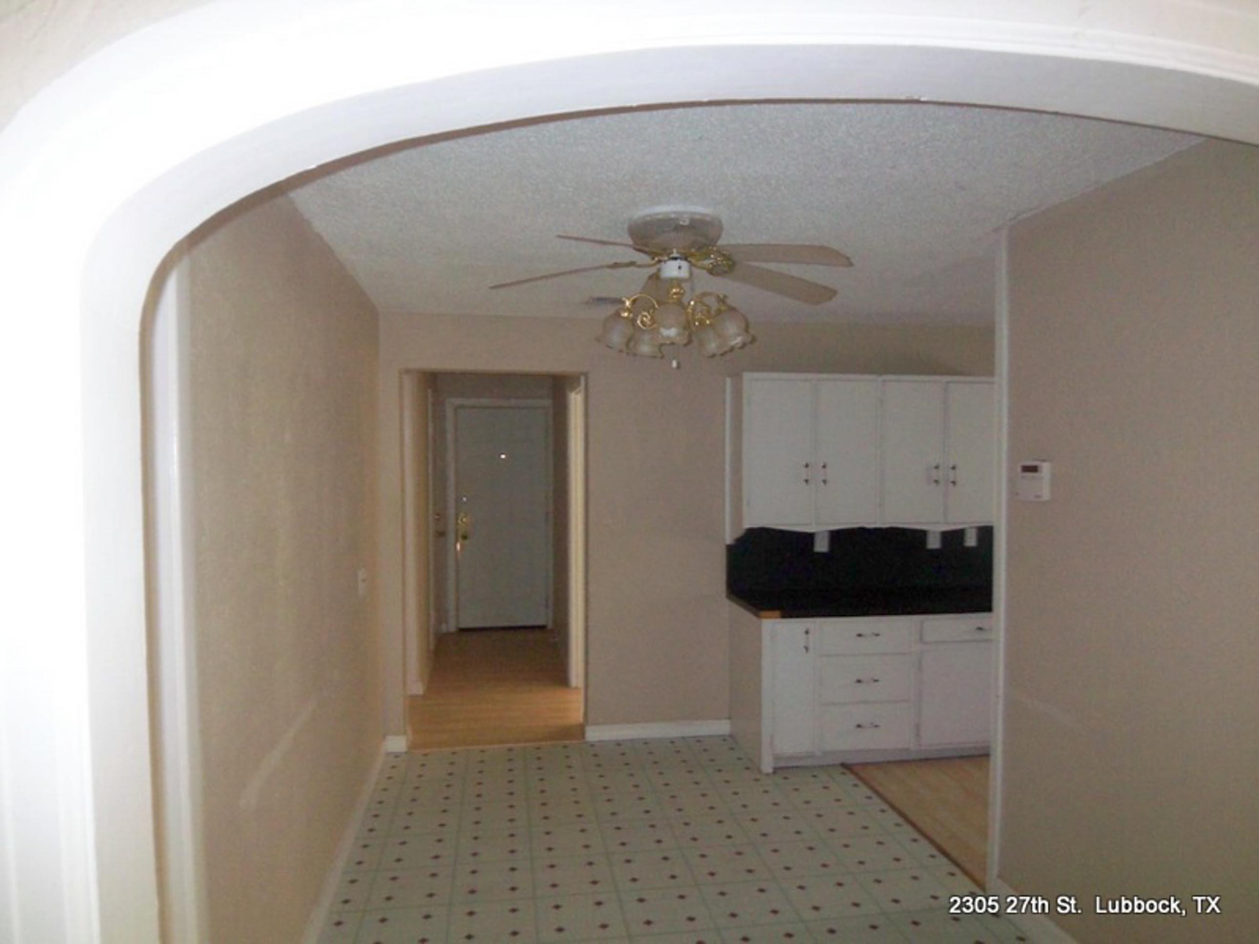 2305 27th Street, Unit FRONT Lubbock, TX 79411 - Photo 4 of 9 a picture of a room