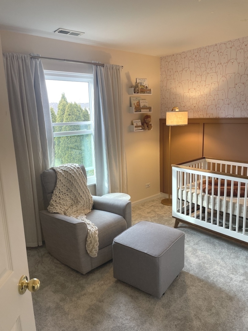 240 Copper Mountain Drive Gilberts, IL 60136 - Photo 11 of 30 a living room with furniture and a window