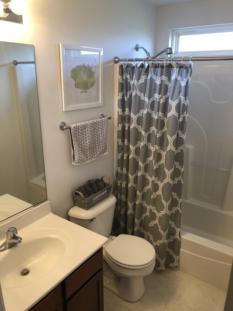 240 Copper Mountain Drive Gilberts, IL 60136 - Photo 12 of 30 a bathroom with a sink toilet and shower