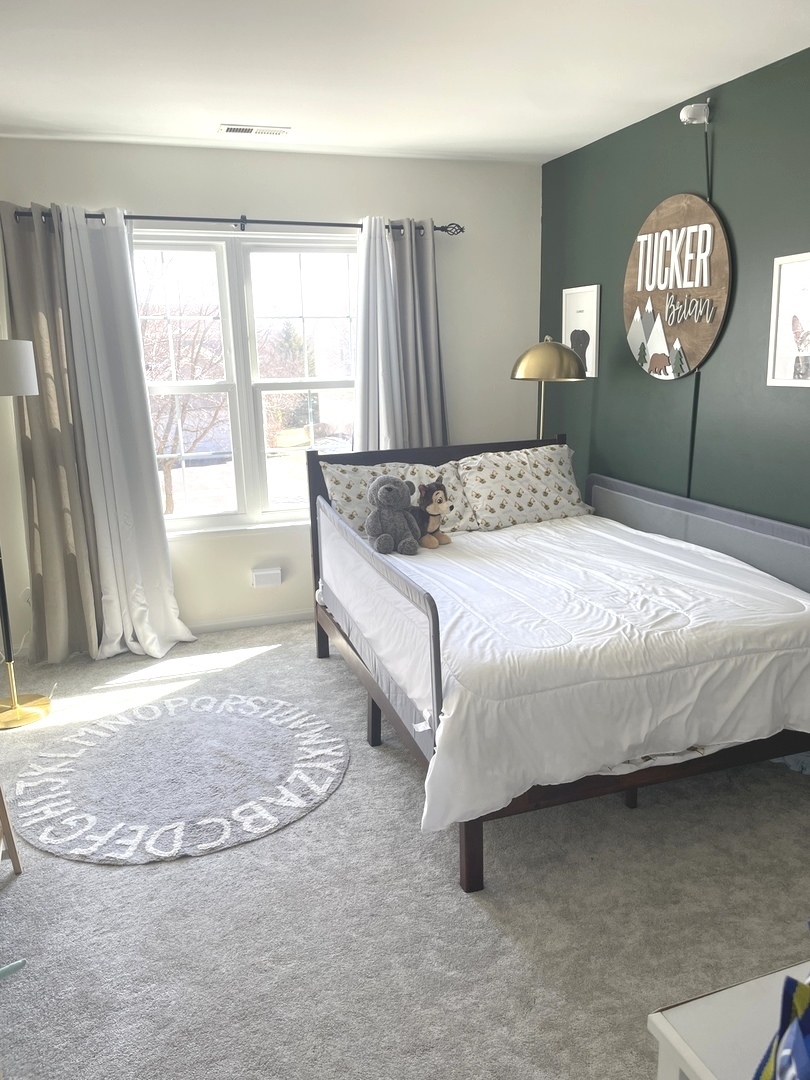 240 Copper Mountain Drive Gilberts, IL 60136 - Photo 13 of 30 a bedroom with a bed and a window