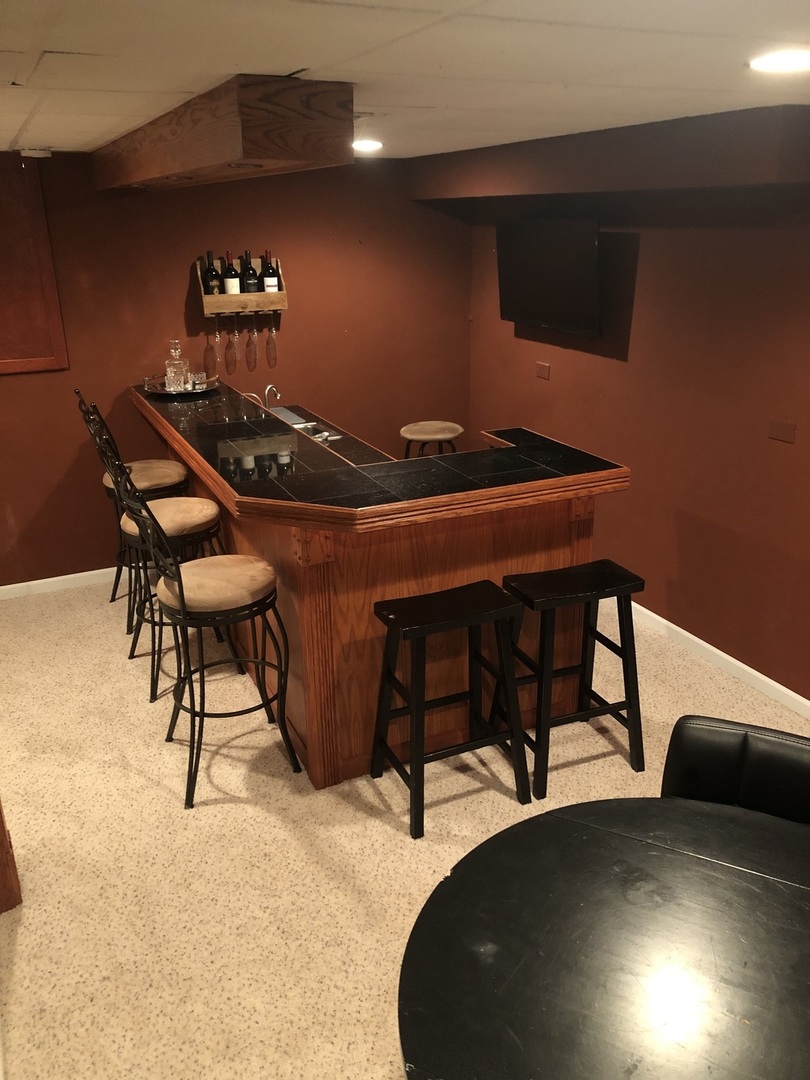 240 Copper Mountain Drive Gilberts, IL 60136 - Photo 25 of 30 a dining room with furniture and wooden floor