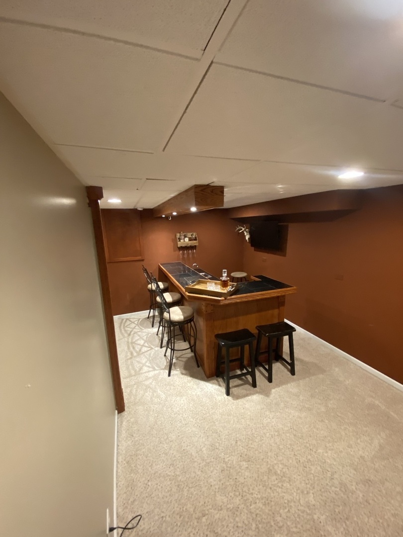 240 Copper Mountain Drive Gilberts, IL 60136 - Photo 26 of 30 a view of a room with chairs