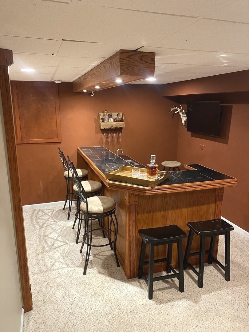 240 Copper Mountain Drive Gilberts, IL 60136 - Photo 28 of 30 a view of a dining room with furniture