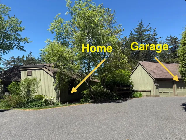 a house with trees in the background