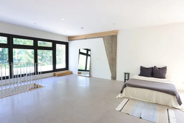 a living room with furniture and a gate