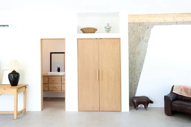 a view of entryway with wooden floor and stairs