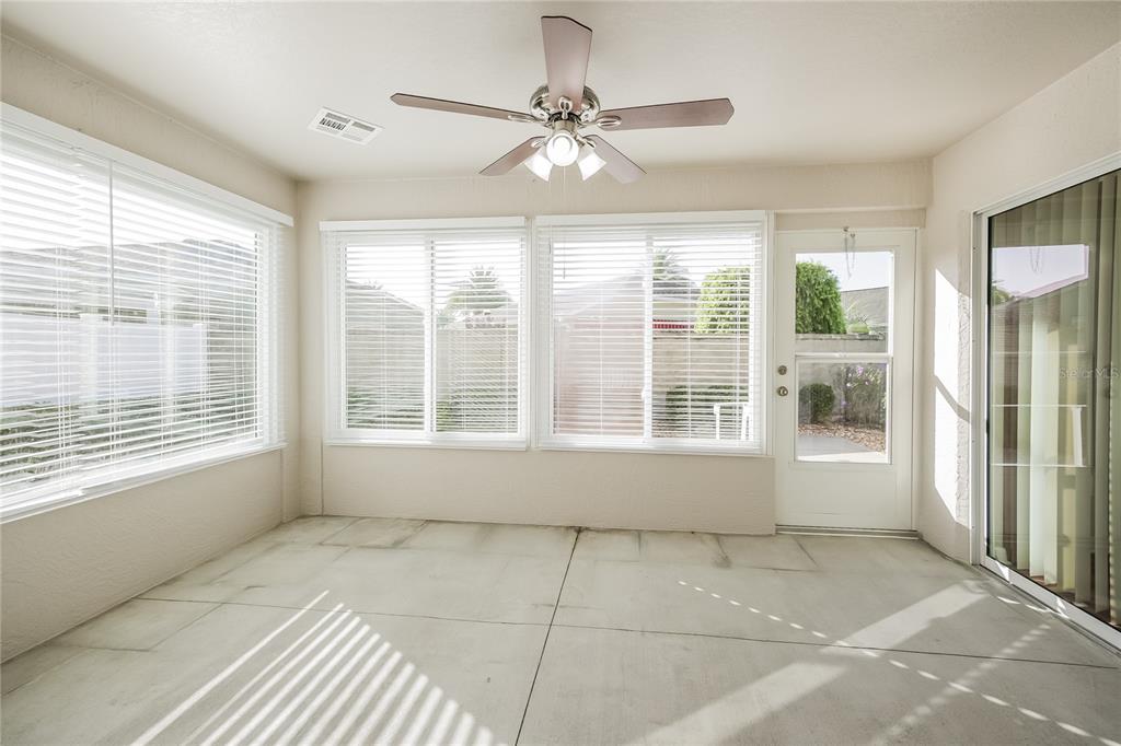 2294 Trailwinds Terrace The Villages, FL 32162 - Photo 7 of 16 a view of an empty room with a window