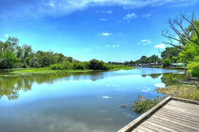 a view of a lake from a balcony