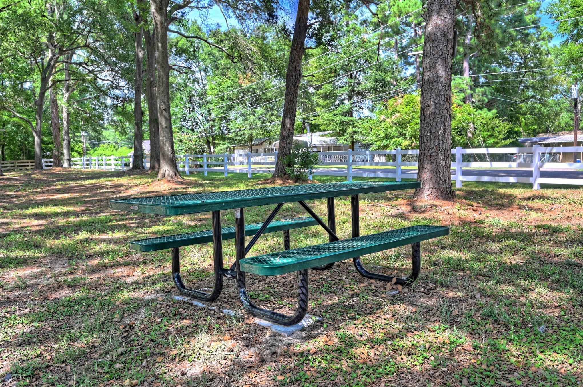 9812 Arbor Oak Willis, TX 77318 - Photo 40 of 40 a view of a bench in a garden