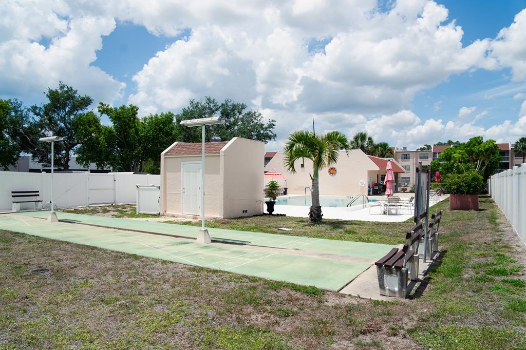 519 Albee Farm Road, Unit 110 Venice, FL 34285 - Photo 30 of 33 a view of a volley ball court