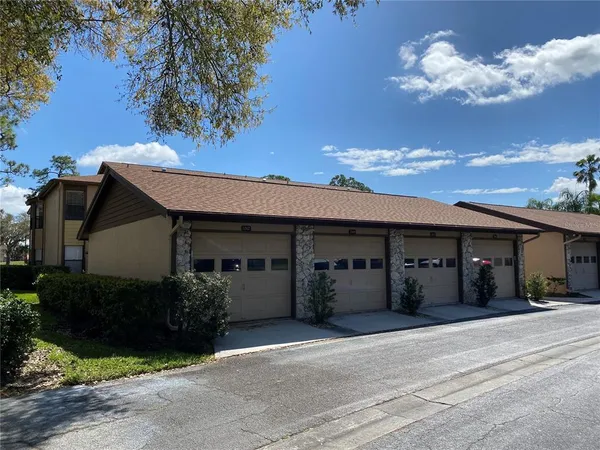 a view of a house with a garage