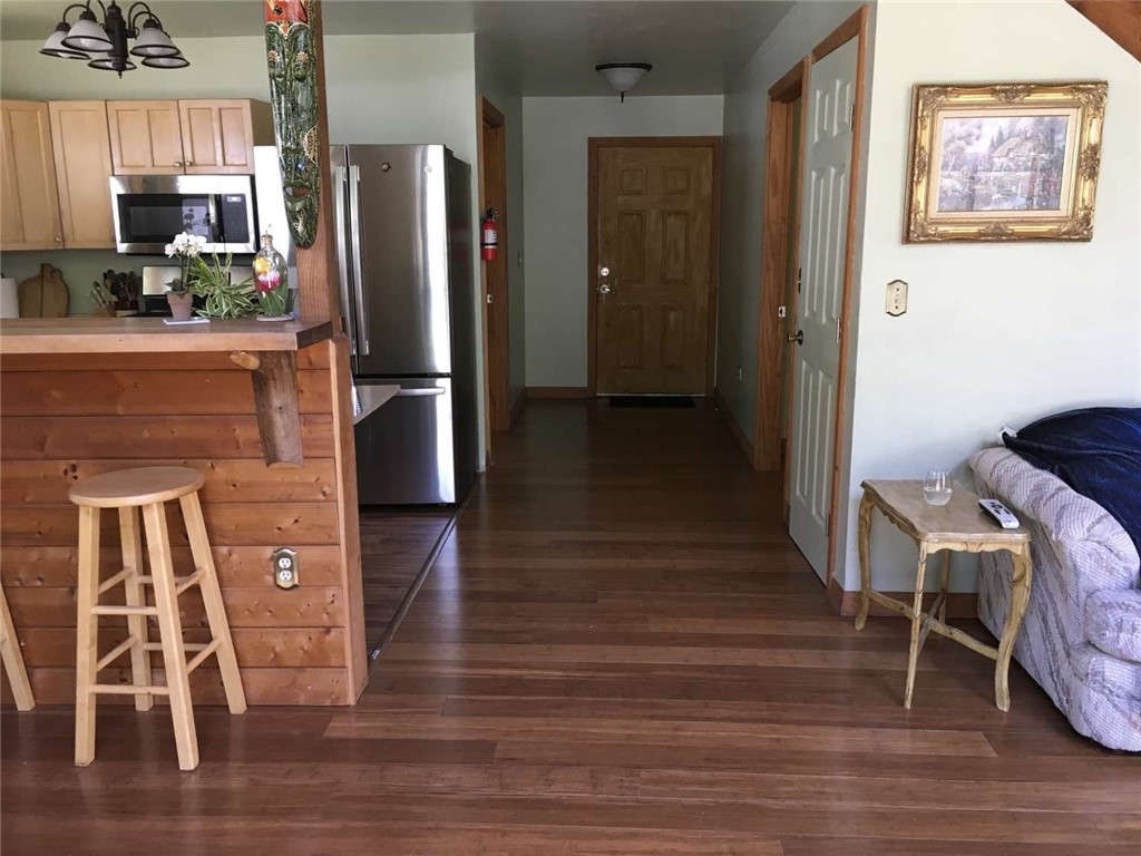 5001 Highway 299 Burnt Ranch, CA 95527 - Photo 18 of 25 a kitchen with stainless steel appliances granite countertop a refrigerator and a stove
