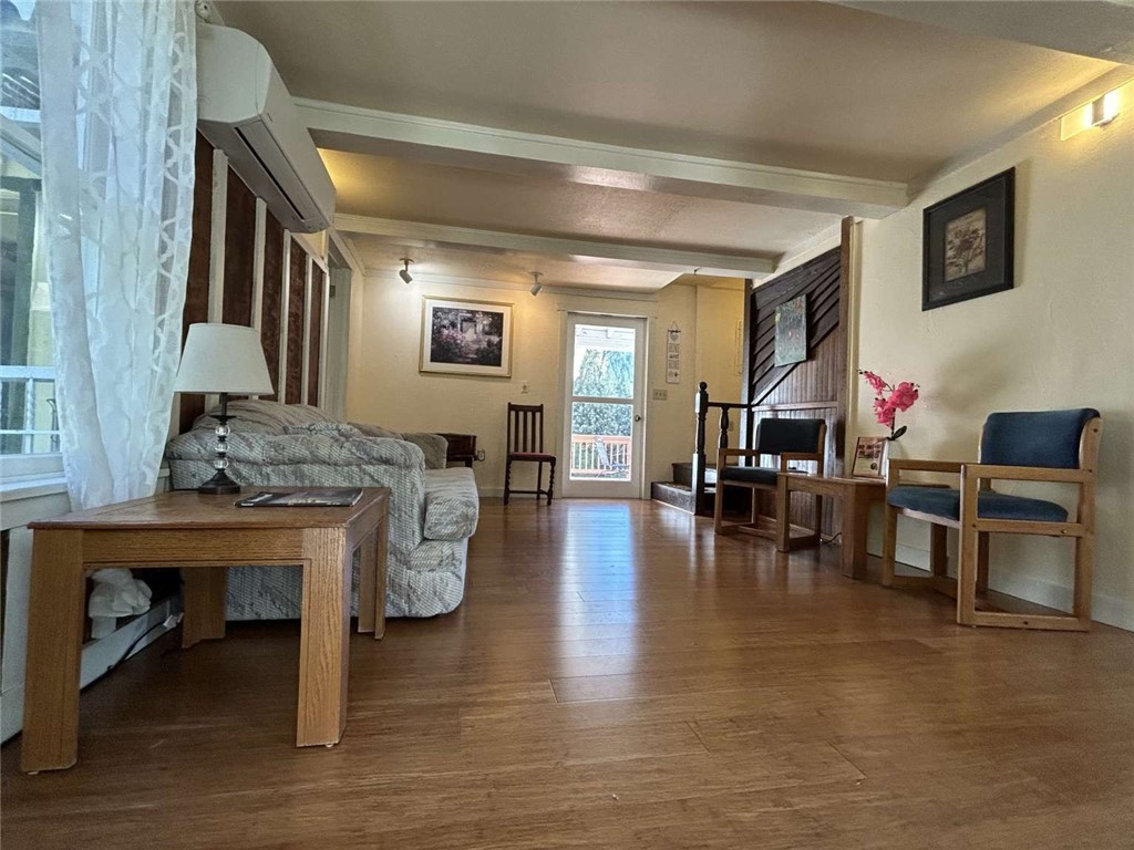 5001 Highway 299 Burnt Ranch, CA 95527 - Photo 2 of 25 a living room with furniture and a wooden floor