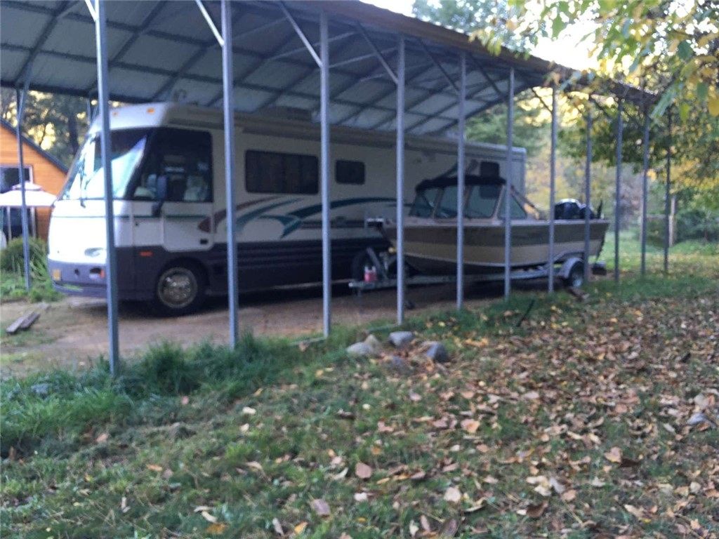 5001 Highway 299 Burnt Ranch, CA 95527 - Photo 25 of 25 a view of a house with a backyard and wooden fence