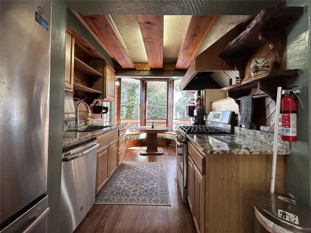 5001 Highway 299 Burnt Ranch, CA 95527 - Photo 4 of 25 a kitchen with stainless steel appliances granite countertop lots of counter top space