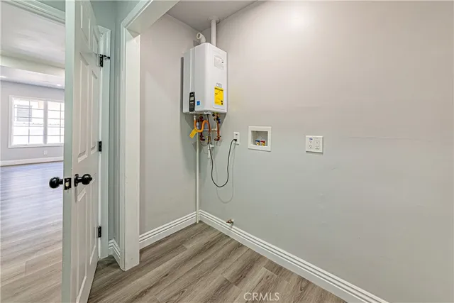 a view of a livingroom with furniture and window