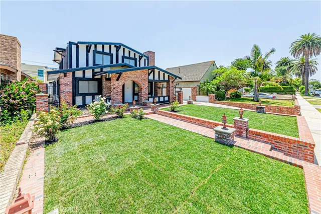 a view of a hallway with entryway wooden floor and front door
