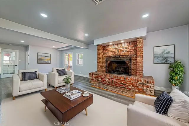 a kitchen with a sink window and cabinets