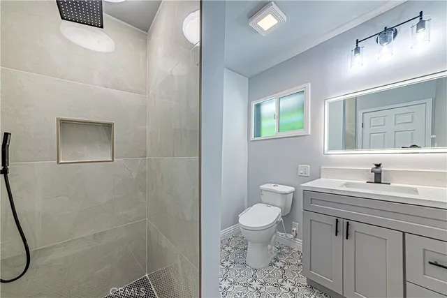 a open kitchen with stainless steel appliances granite countertop a lot of counter space and wooden floors