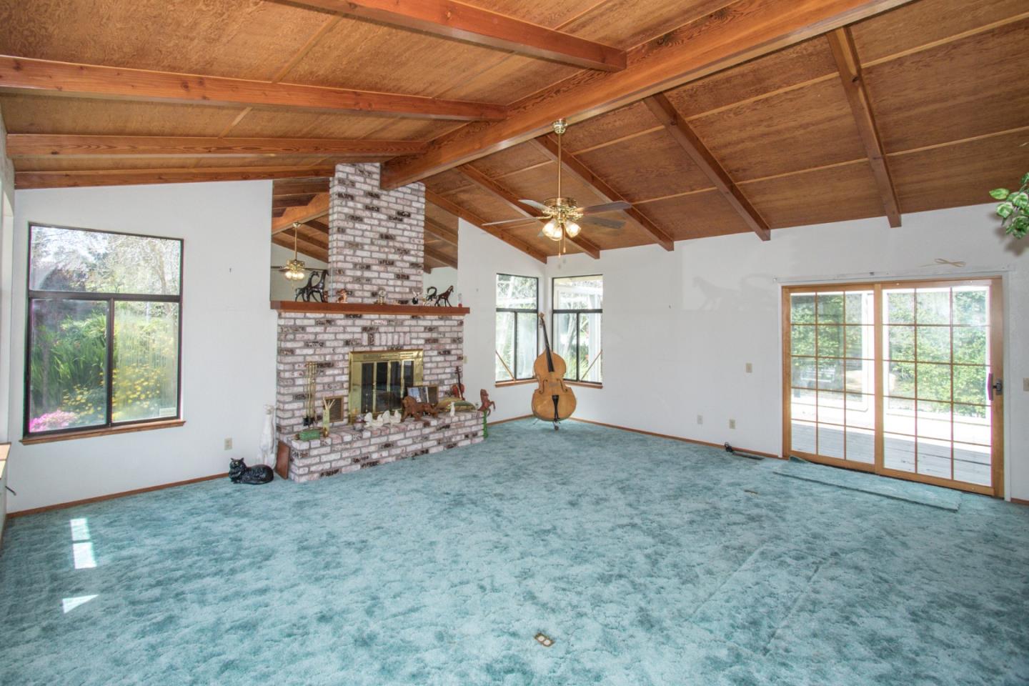105 Mountain View Road Watsonville, CA 95076 - Photo 12 of 26 a view of an empty room with a fireplace