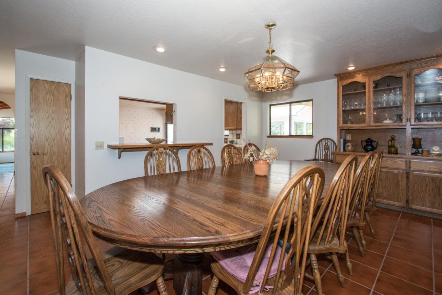105 Mountain View Road Watsonville, CA 95076 - Photo 13 of 26 a view of a dining room with furniture window and wooden floor