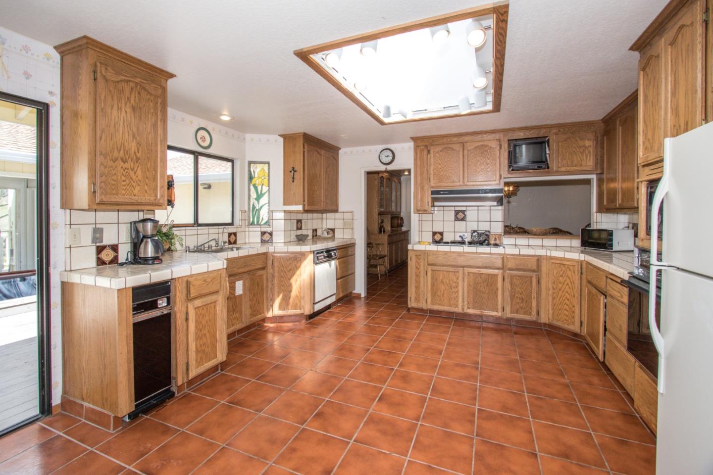105 Mountain View Road Watsonville, CA 95076 - Photo 14 of 26 a kitchen with stainless steel appliances a stove sink and cabinets