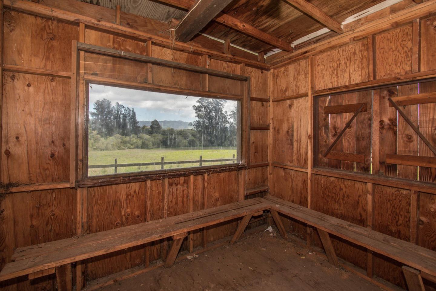 105 Mountain View Road Watsonville, CA 95076 - Photo 6 of 26 a view of a porch with wooden floor and iron stairs