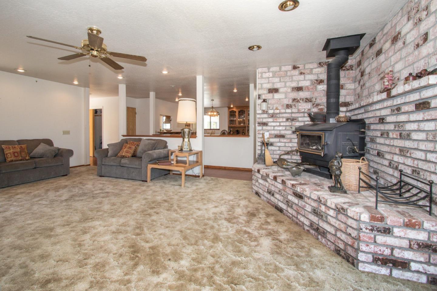 105 Mountain View Road Watsonville, CA 95076 - Photo 10 of 26 a living room with fireplace furniture and a fireplace