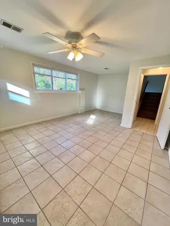 a view of an empty room and window