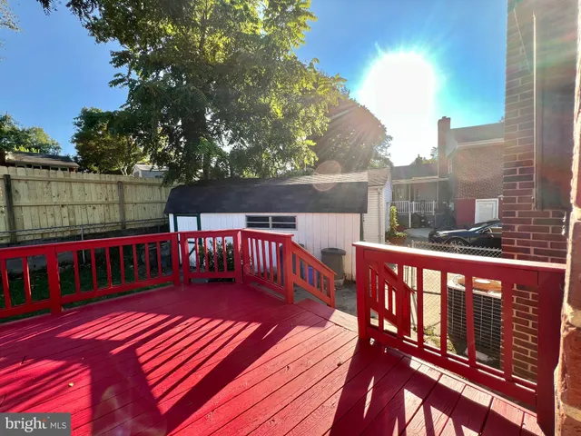 a view of a two chairs on the roof deck