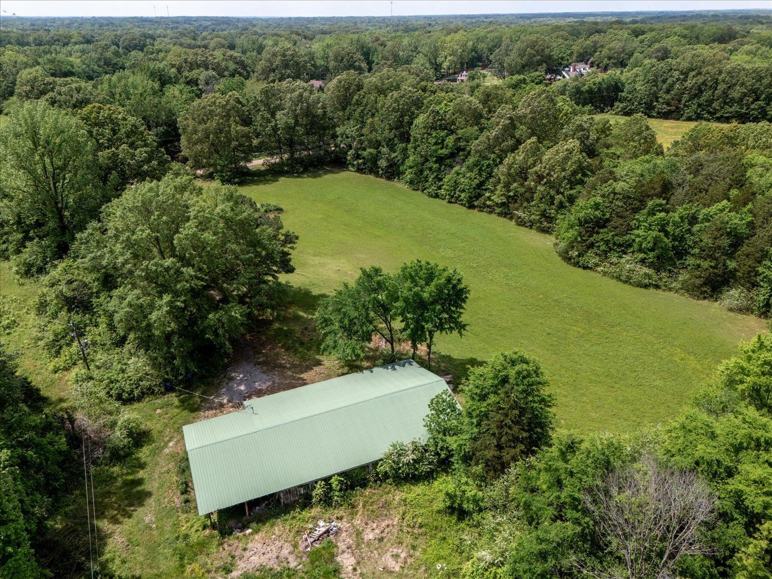 11620 East Holmes Road Collierville, TN 38017 - Photo 18 of 28 Drone / aerial view featuring a view of trees