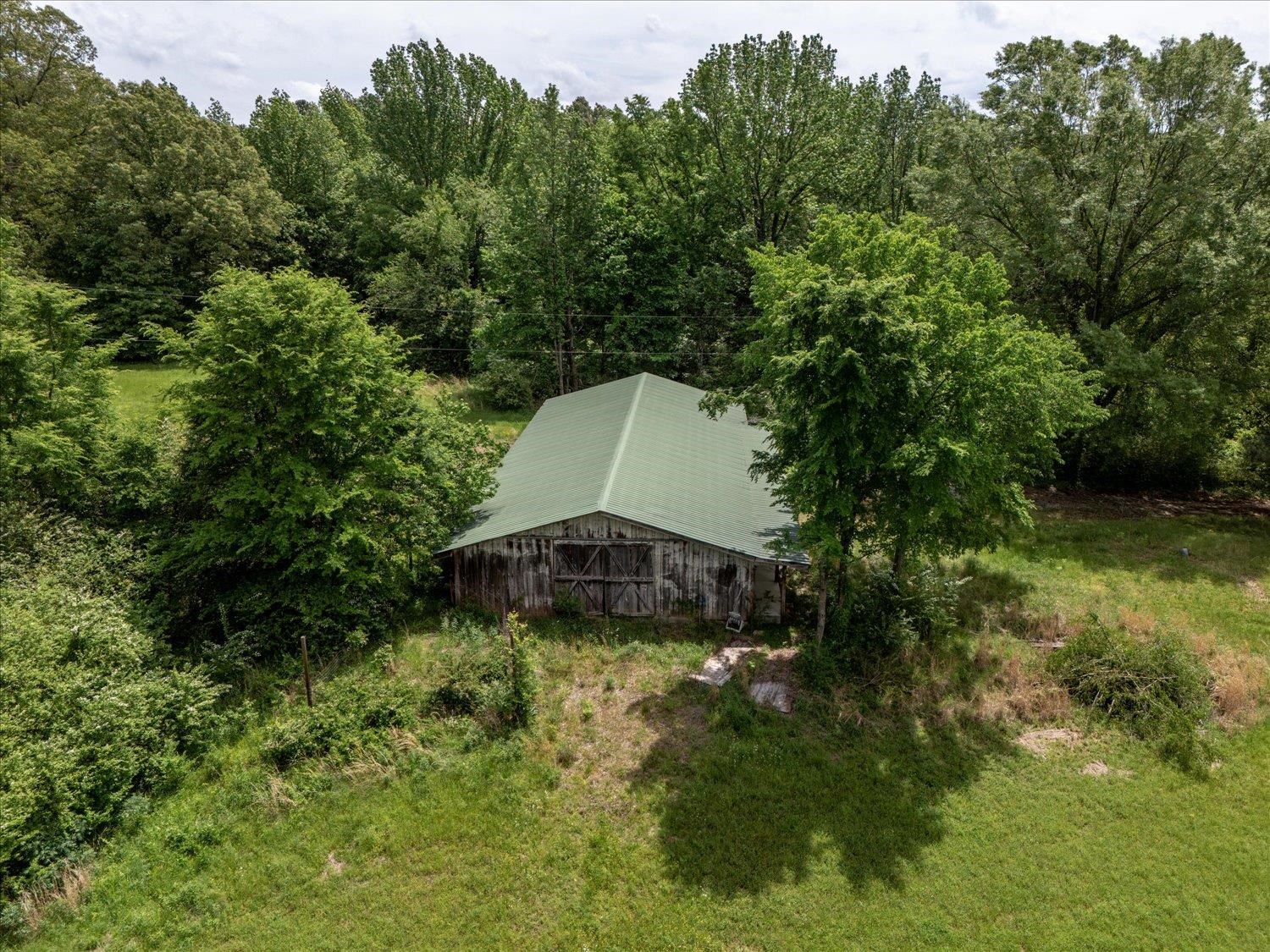 11620 East Holmes Road Collierville, TN 38017 - Photo 19 of 28 Drone / aerial view with a view of trees