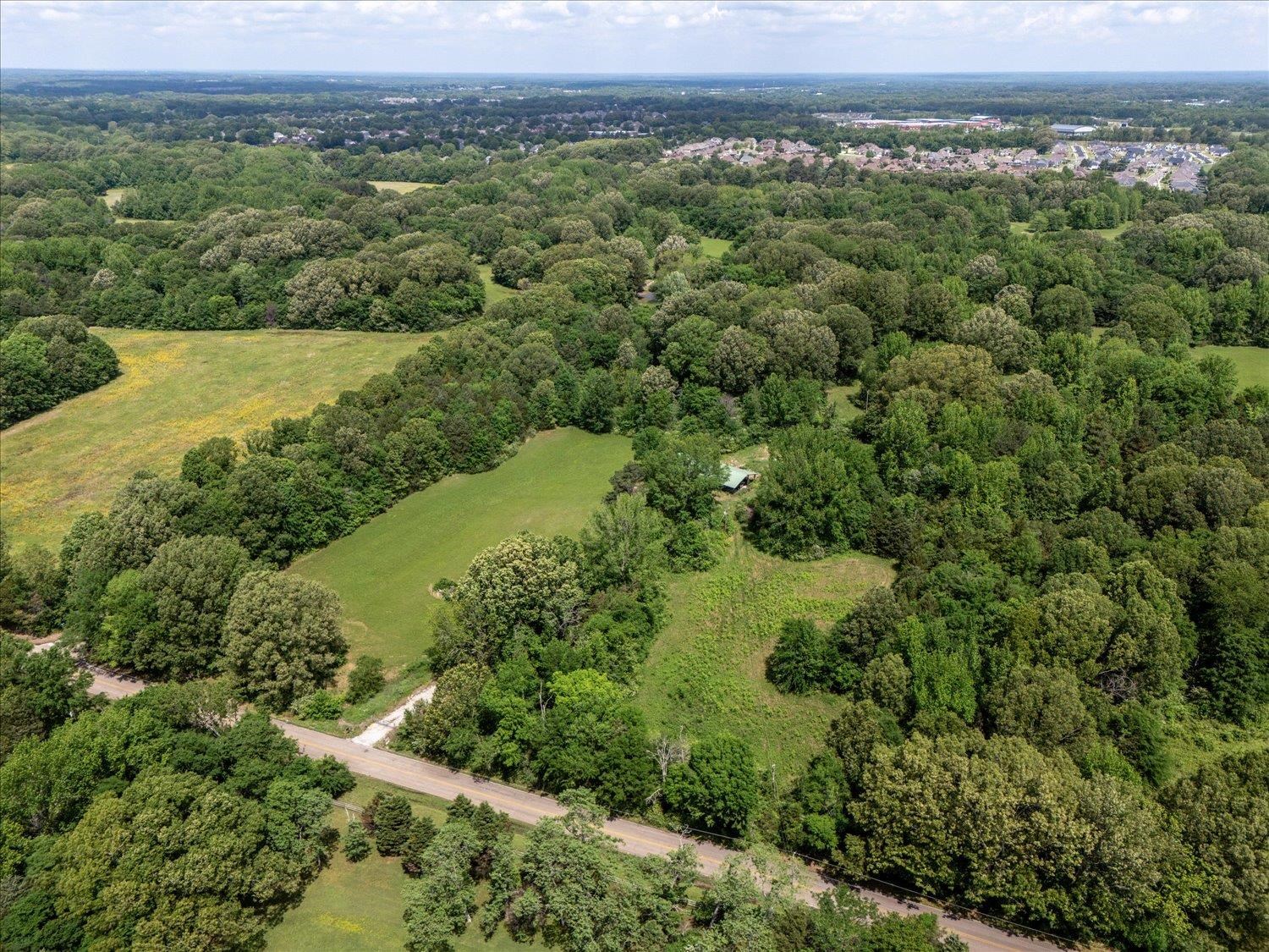11620 East Holmes Road Collierville, TN 38017 - Photo 28 of 28 Bird's eye view with a forest view