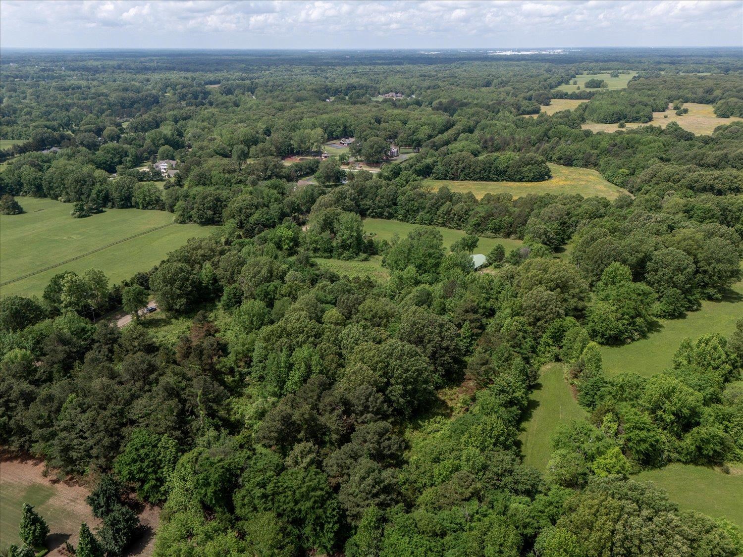 11620 East Holmes Road Collierville, TN 38017 - Photo 7 of 28 Birds eye view of property featuring a forest view
