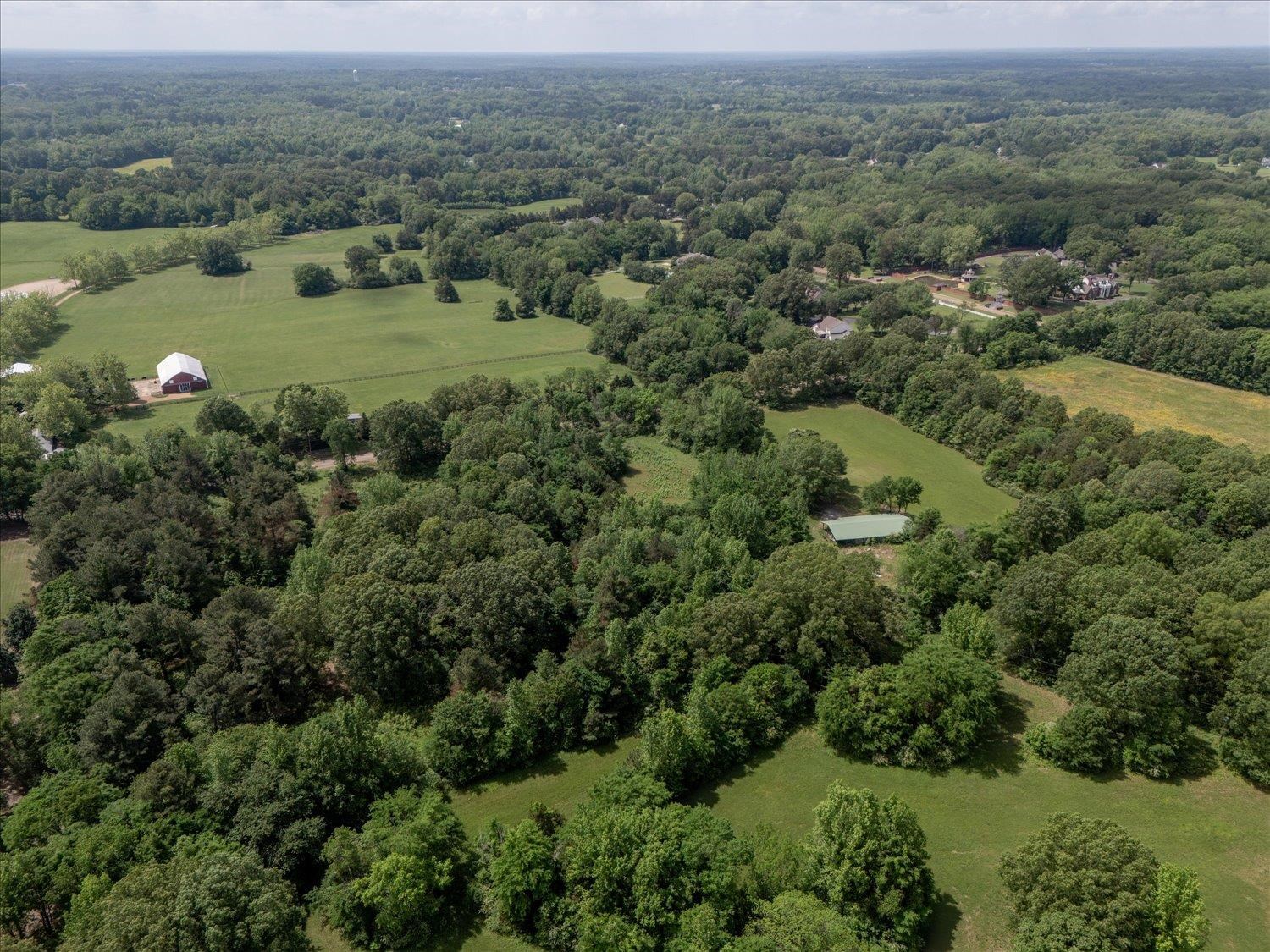 11620 East Holmes Road Collierville, TN 38017 - Photo 9 of 28 Aerial view with a wooded view
