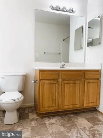 a bathroom with a sink and a toilet