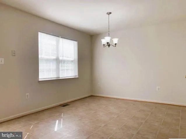 en empty room with windows