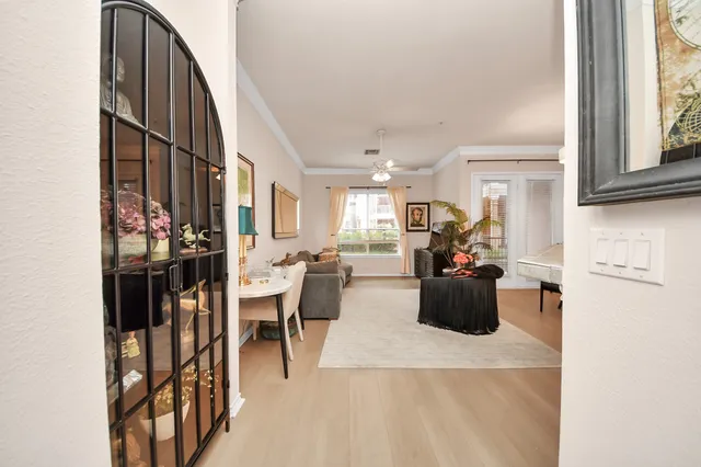 a living room with furniture and a window